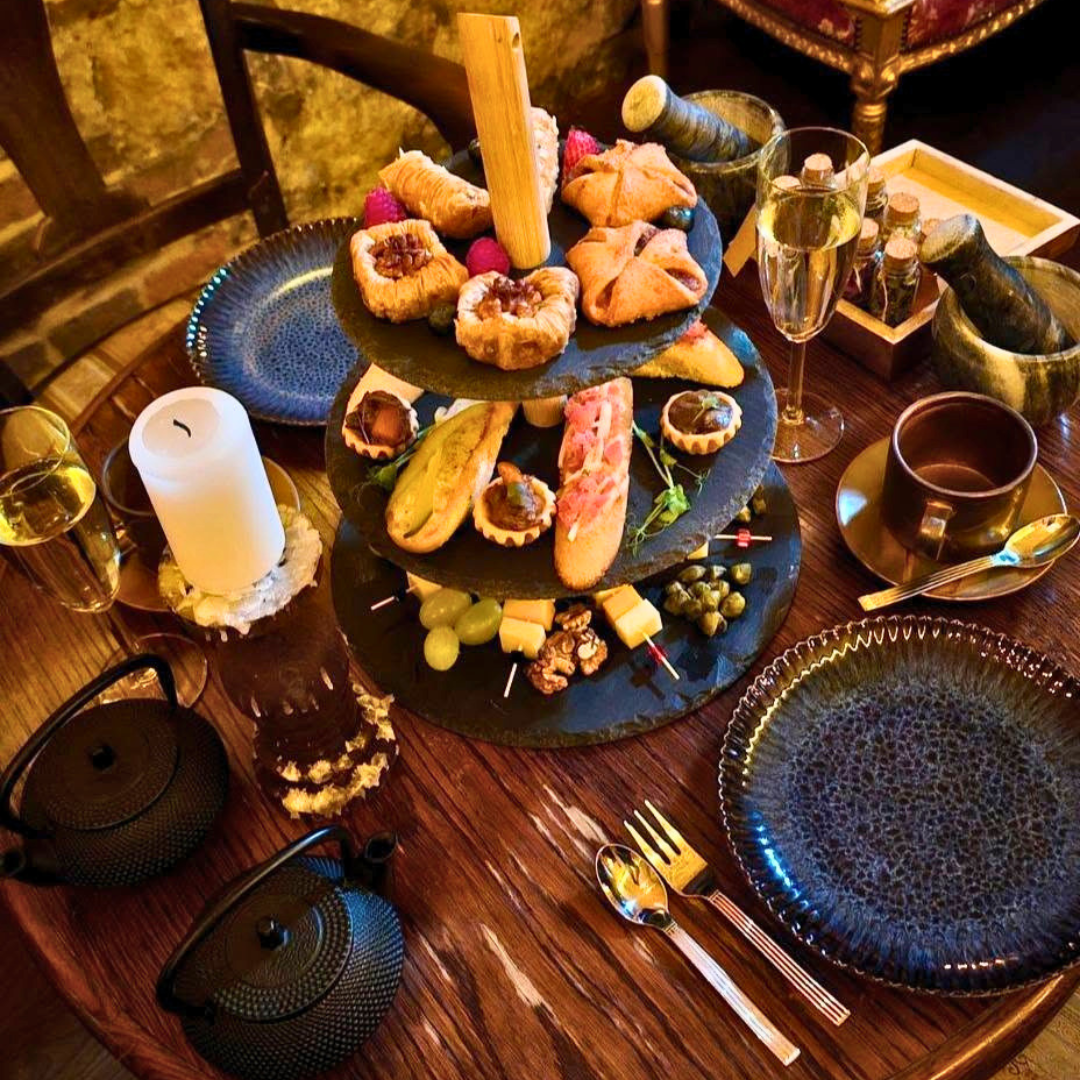 Birthday afternoon tea in Krakow with sweet treats and a glass of Prosecco