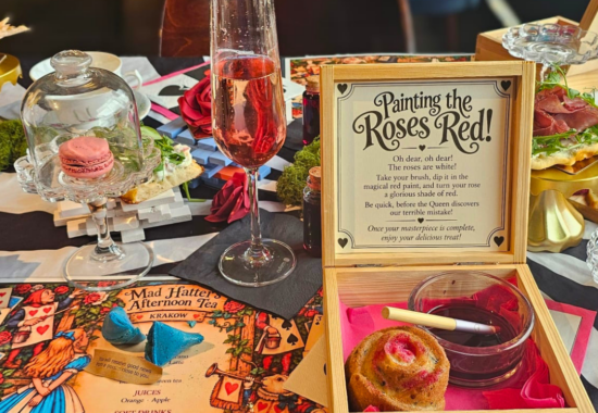 Mad Hatter's Afternoon Tea in Krakow, a Wonderland table with Prosecco and Eat Me treats
