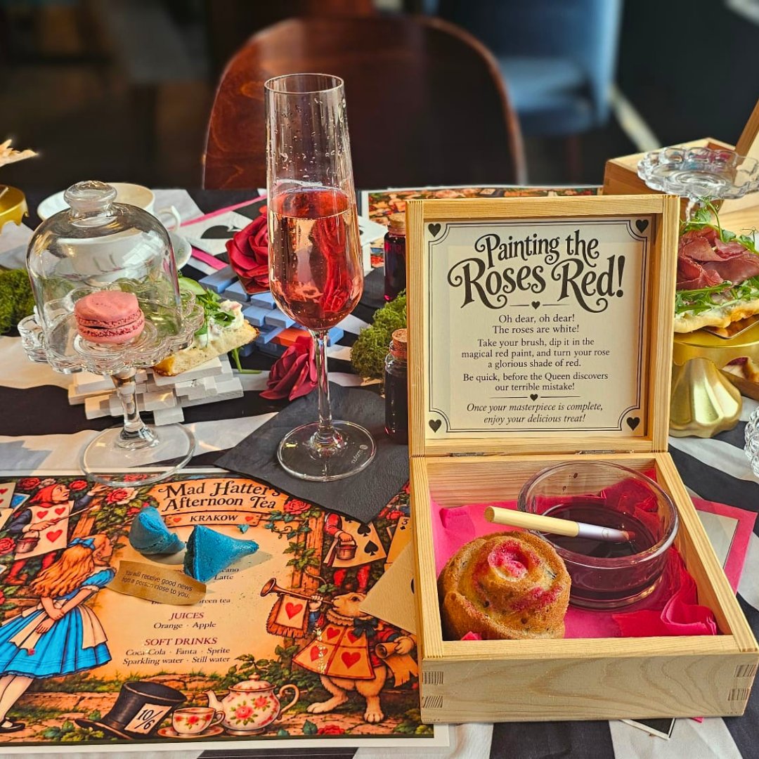 Mad Hatter's Afternoon Tea in Krakow, a Wonderland table with Prosecco and Eat Me treats